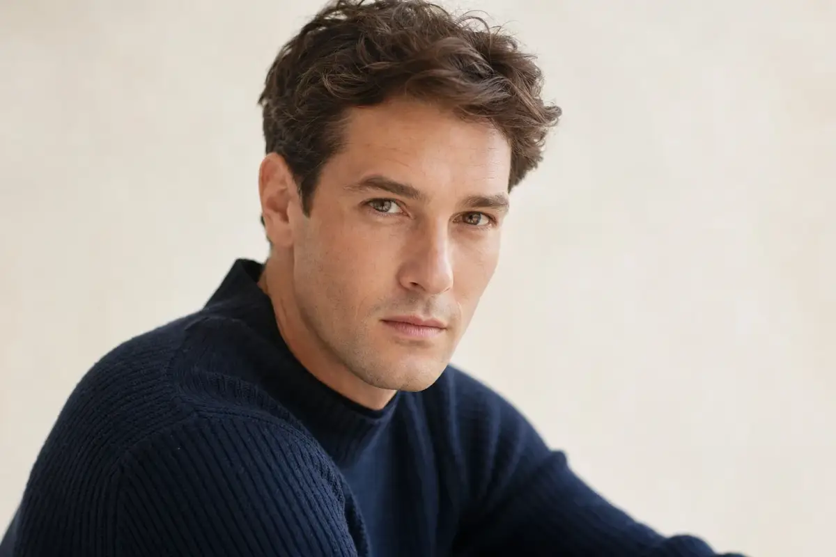 Man in his thirties with a sharp clean shaven jaw