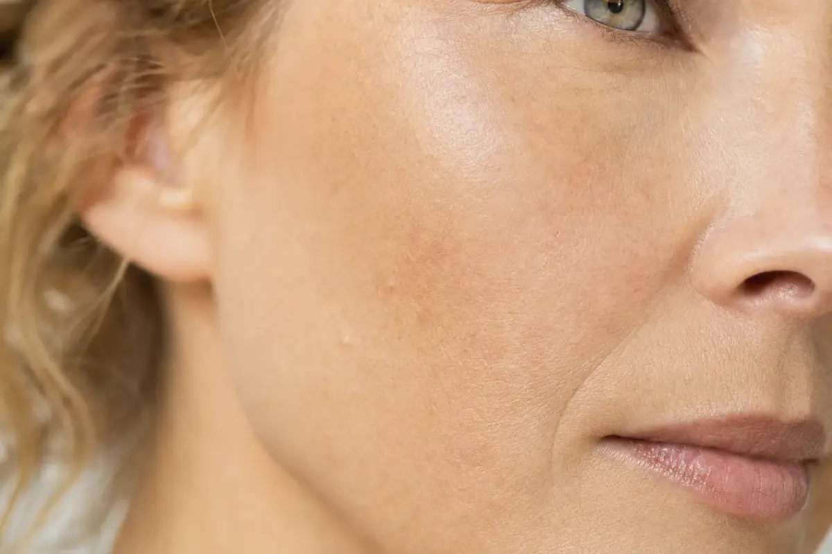 Macro of the cheek of a woman in her forties