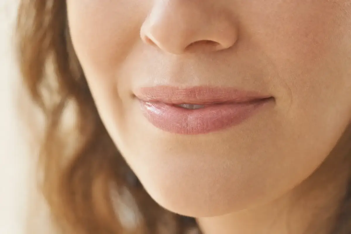 Close-up of the smile area of a woman in her forties
