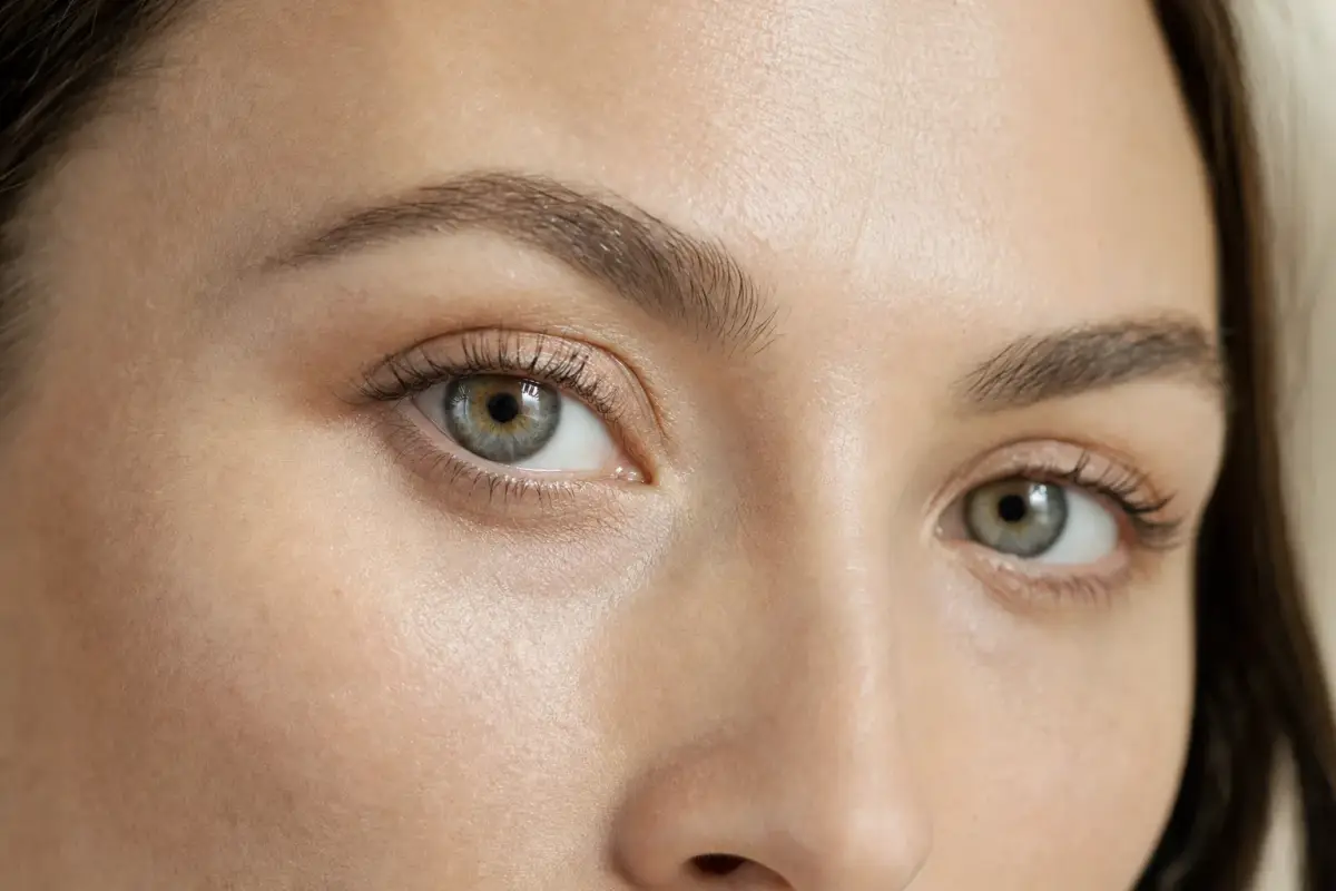 Close-up of the eyes and under eye area of a woman in her thirties