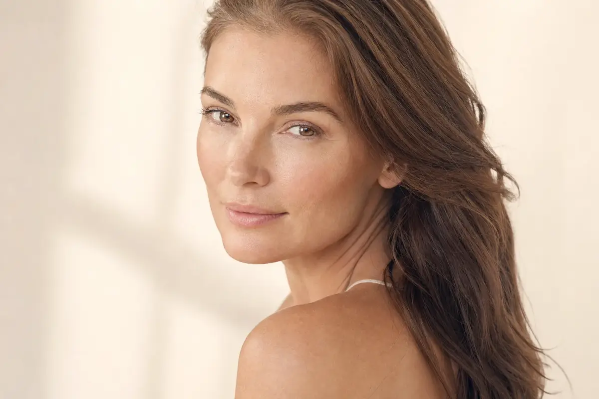Woman in her forties with radiant firm skin