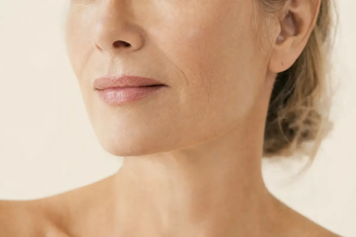 Close-up of the lower face of a woman in her fifties